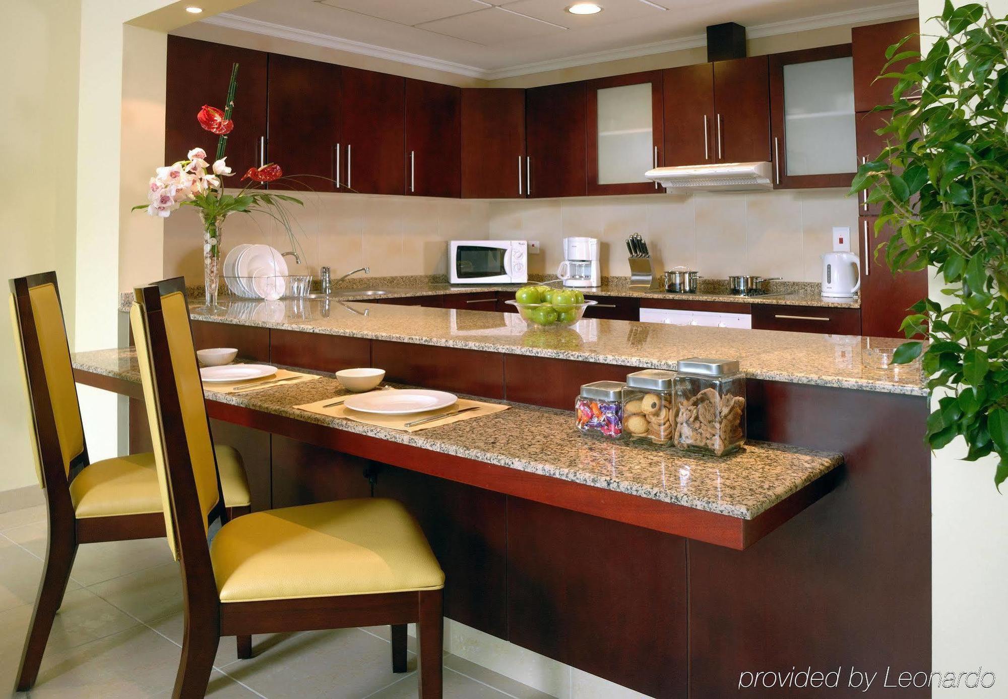 Marriott Executive Apartments Manama, Bahrain Номер фото A typical kitchen